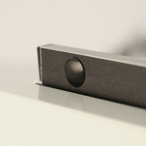 roll-up-bottone-fissaggio Roll-up Velo120, con botón de seguridad